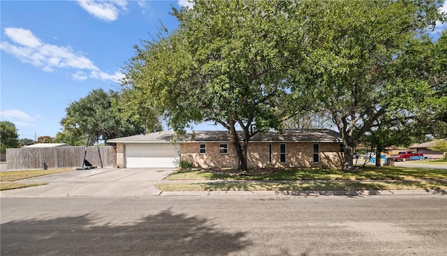 ranch-style home with a garage