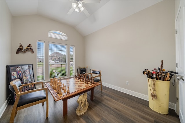 interior space with lofted ceiling, dark hardwood / wood-style floors, and ceiling fan