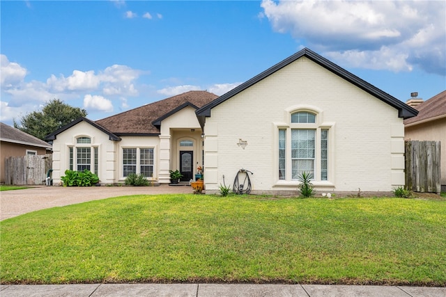 view of front of property with a front lawn