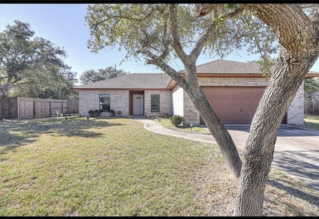 829 Redwood Ave, Rockport, TX 78382 - single story home with a front lawn and a garage