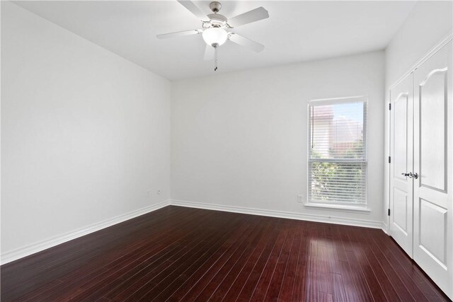 4529 Ballad Tree Dr, Corpus Christi, TX 78410 - unfurnished room with dark wood-style flooring and ceiling fan