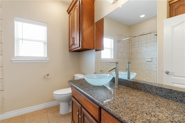 4529 Ballad Tree Dr, Corpus Christi, TX 78410 - bathroom with vanity, tile patterned floors, and tiled shower