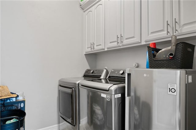 15114 Barataria Dr, Corpus Christi, TX 78418 - laundry area with separate washer and dryer and cabinet space
