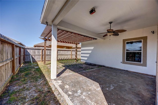 view of patio featuring ceiling fan