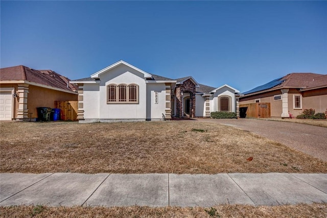 ranch-style house featuring a garage