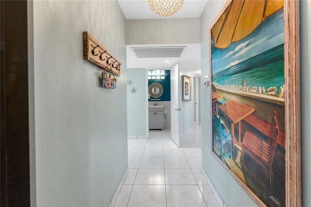 hallway with light tile patterned flooring