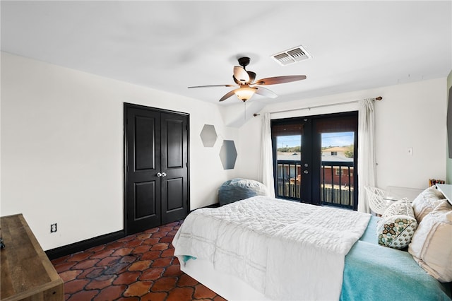 tiled bedroom featuring ceiling fan, access to exterior, and french doors