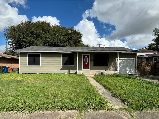 single story home featuring a front lawn and a garage