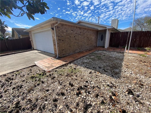 exterior space featuring a garage