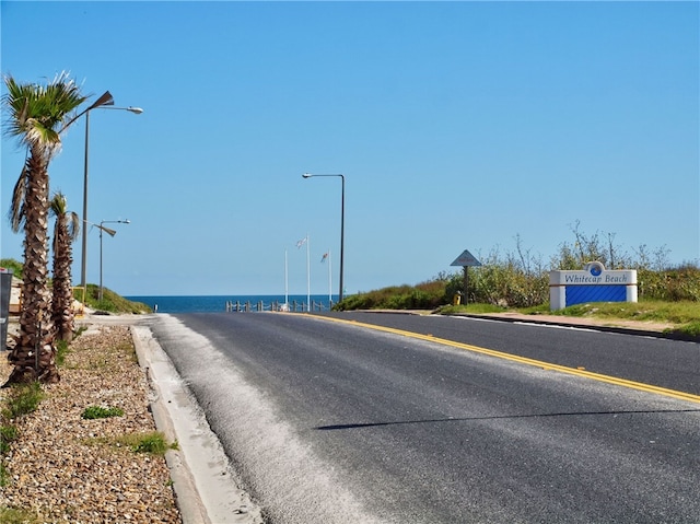 view of street featuring a water view