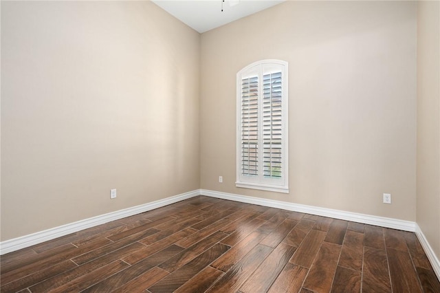 7918 Stampede Dr, Corpus Christi, TX 78414 - spare room with dark wood finished floors, baseboards, and ceiling fan