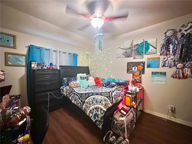 4734 Fox Trot Dr, Corpus Christi, TX 78413 - bedroom featuring baseboards, ceiling fan, and wood finished floors