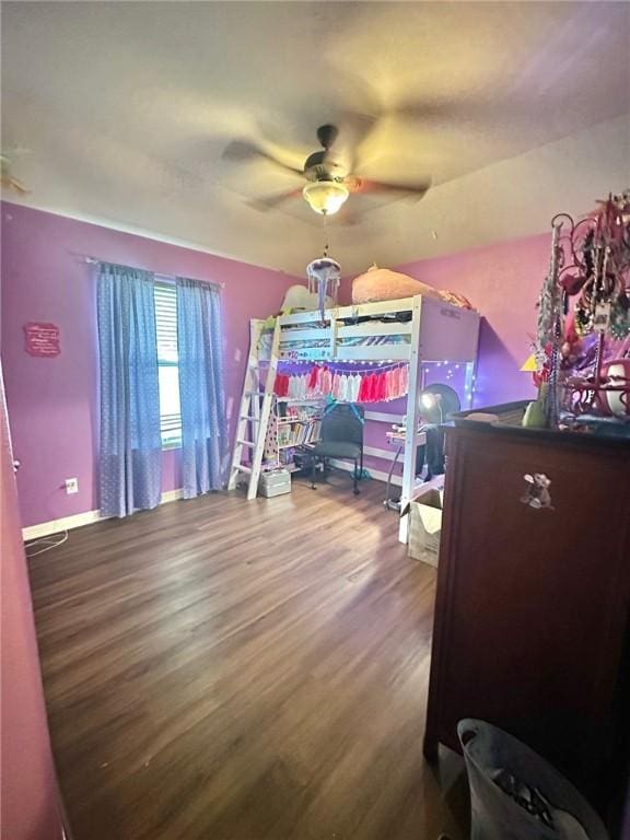 4734 Fox Trot Dr, Corpus Christi, TX 78413 - bedroom with a ceiling fan, baseboards, and wood finished floors