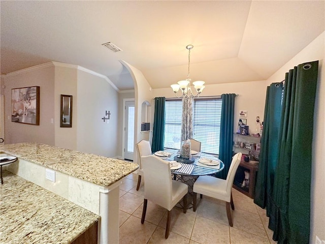 4734 Fox Trot Dr, Corpus Christi, TX 78413 - dining room featuring visible vents, crown molding, lofted ceiling, an inviting chandelier, and light tile patterned flooring