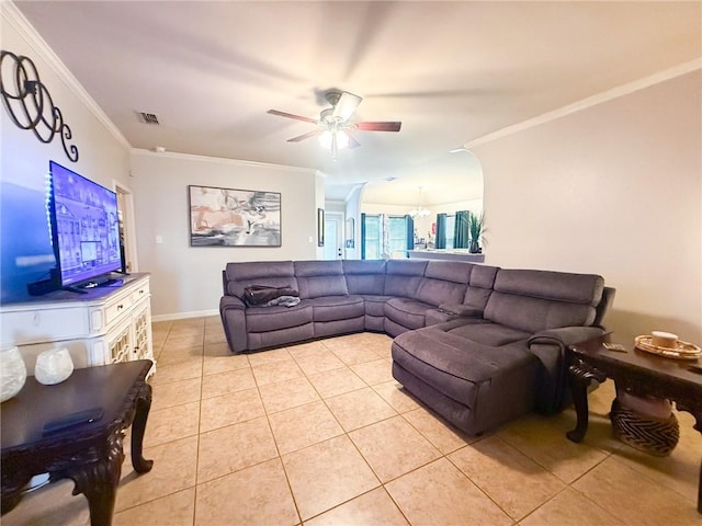4734 Fox Trot Dr, Corpus Christi, TX 78413 - living area with crown molding, light tile patterned flooring, ceiling fan with notable chandelier, baseboards, and visible vents