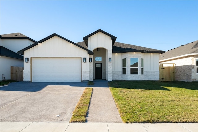 4133 Azali Dr, Corpus Christi, TX 78414 - view of front facade featuring board and batten siding, a garage, concrete driveway, and stone siding