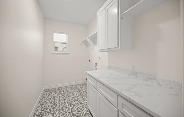 4133 Azali Dr, Corpus Christi, TX 78414 - laundry area featuring cabinet space, baseboards, and electric dryer hookup