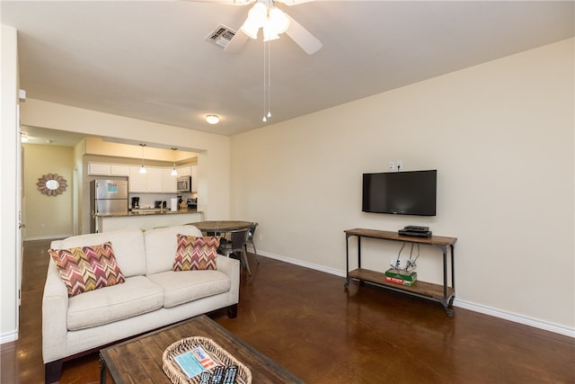 living room featuring ceiling fan