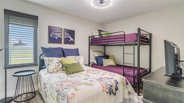 bedroom with wood finished floors