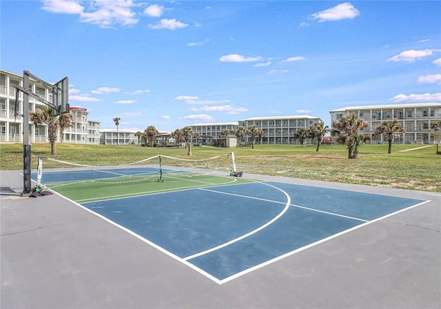 view of basketball court featuring a yard and a tennis court