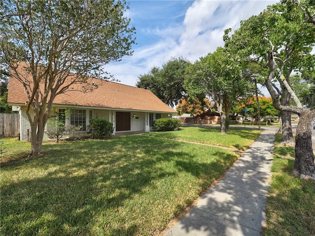 view of front of home with a front lawn