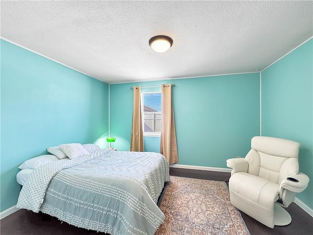 bedroom featuring a textured ceiling