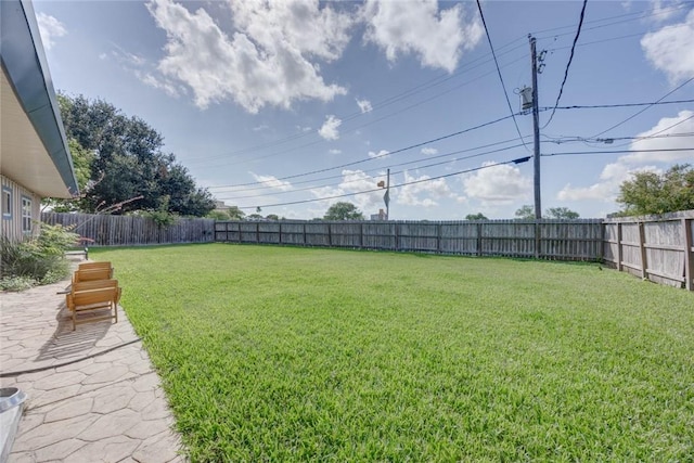 239 Purl Pl, Corpus Christi, TX 78412 - fenced backyard with a patio area