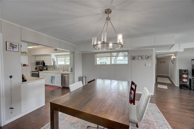 239 Purl Pl, Corpus Christi, TX 78412 - dining area with dark wood finished floors and a chandelier