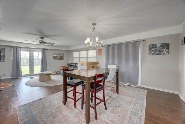239 Purl Pl, Corpus Christi, TX 78412 - dining room featuring a chandelier, wood finished floors, and a ceiling fan