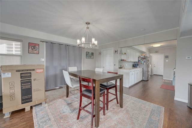 239 Purl Pl, Corpus Christi, TX 78412 - dining room with a chandelier and dark wood finished floors