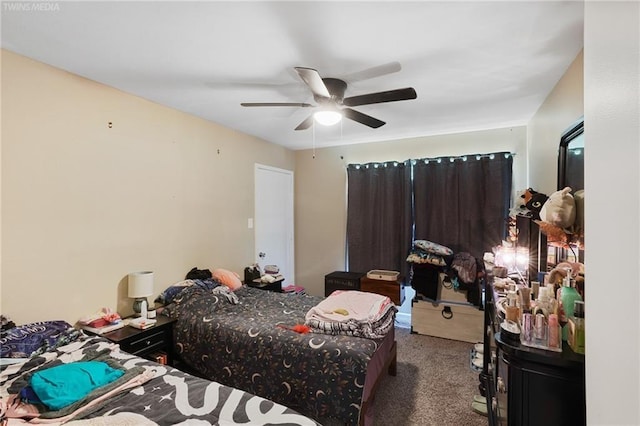 carpeted bedroom featuring ceiling fan