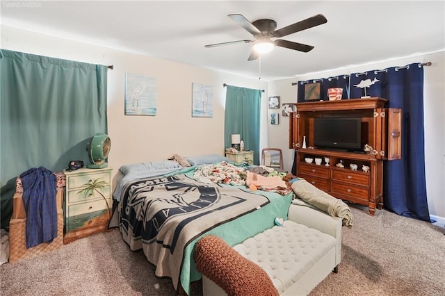 bedroom with ceiling fan and carpet floors