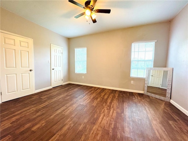 2514 Dwyer Dr, Corpus Christi, TX 78410 - unfurnished bedroom with dark wood-style flooring and ceiling fan