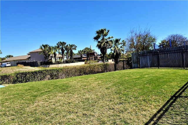 view of yard featuring fence