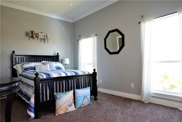 carpeted bedroom featuring baseboards and ornamental molding