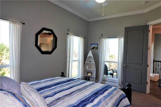 bedroom featuring wood finished floors, ceiling fan, and crown molding