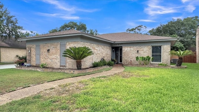 5301 Bromley Dr, Corpus Christi, TX 78413 - single story home featuring brick siding and a shingled roof