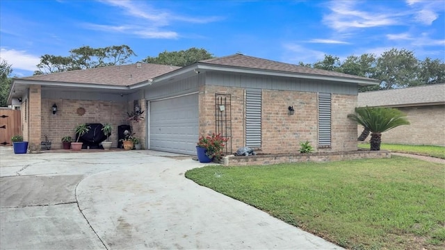 5301 Bromley Dr, Corpus Christi, TX 78413 - view of side of home with brick siding, concrete driveway, a lawn, a garage, and roof with shingles
