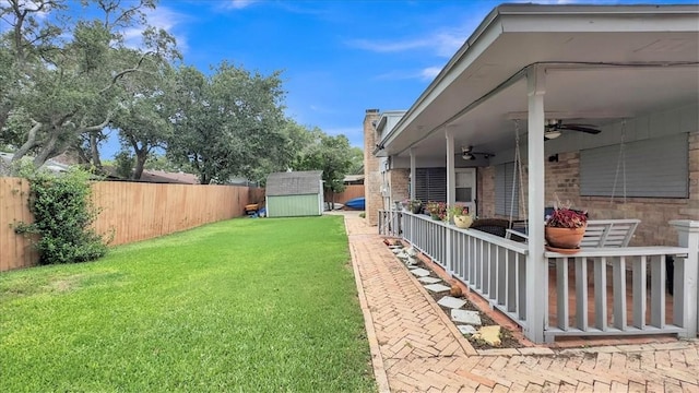 5301 Bromley Dr, Corpus Christi, TX 78413 - fenced backyard featuring ceiling fan and a shed