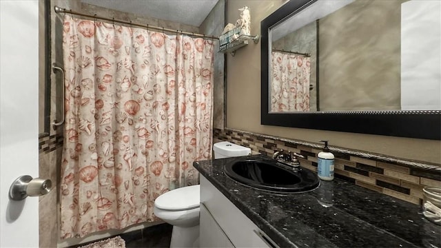 5301 Bromley Dr, Corpus Christi, TX 78413 - full bathroom with decorative backsplash, vanity, and a shower with shower curtain