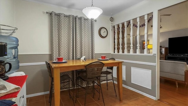 5301 Bromley Dr, Corpus Christi, TX 78413 - dining room with ornamental molding, an office area, and tile patterned floors