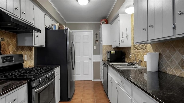 5301 Bromley Dr, Corpus Christi, TX 78413 - kitchen featuring stainless steel appliances, under cabinet range hood, ornamental molding, white cabinets, and light tile patterned floors