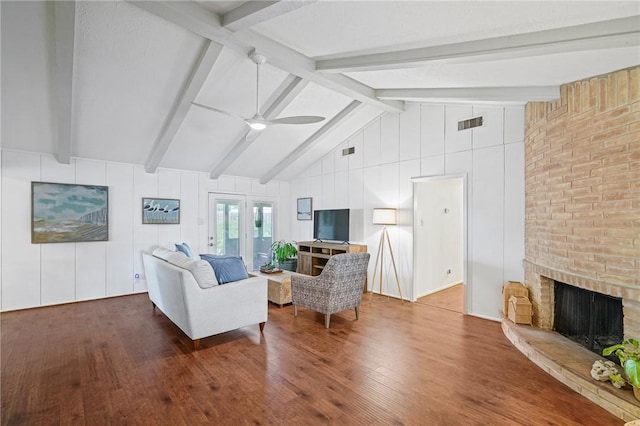 6622 Pharaoh Dr, Corpus Christi, TX 78412 - living area featuring wood finished floors, a ceiling fan, and a brick fireplace