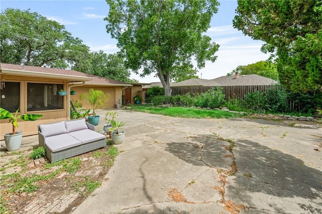 6622 Pharaoh Dr, Corpus Christi, TX 78412 - view of patio / terrace featuring driveway and an attached garage