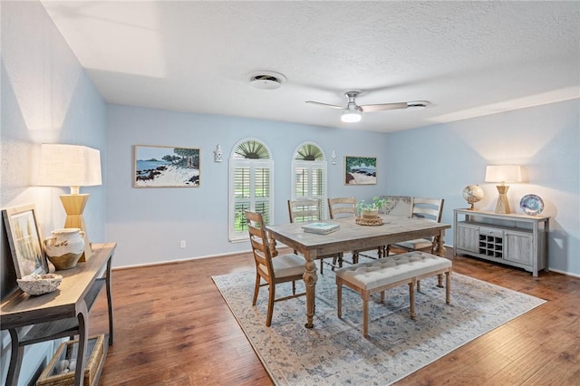 6622 Pharaoh Dr, Corpus Christi, TX 78412 - dining area with ceiling fan, wood finished floors, and a textured ceiling