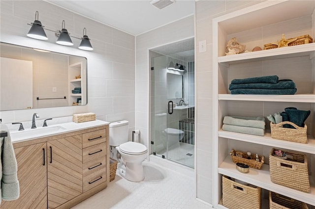 6622 Pharaoh Dr, Corpus Christi, TX 78412 - full bathroom with tile walls, vanity, and a stall shower