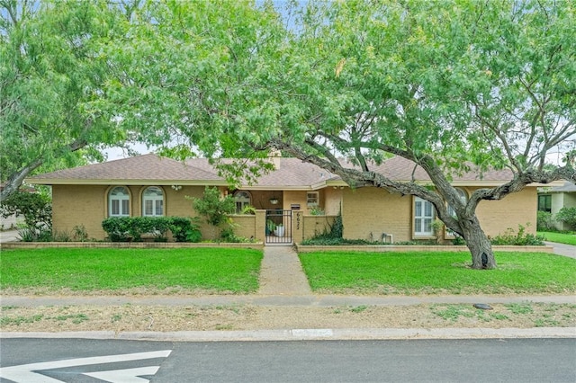 6622 Pharaoh Dr, Corpus Christi, TX 78412 - single story home featuring a gate and roof with shingles