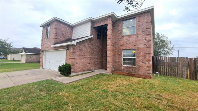 2906 Alice Ln, Kingsville, TX 78363 - traditional-style home with brick siding, a front yard, concrete driveway, and fence