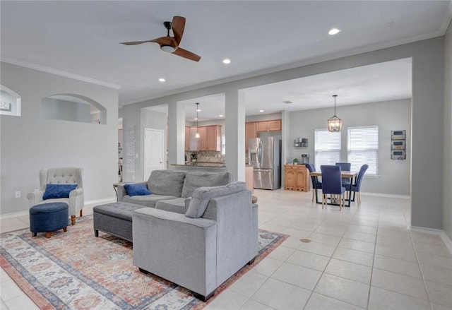 7522 Bell Isle, Corpus Christi, TX 78414 - living area featuring crown molding, a ceiling fan, recessed lighting, light tile patterned flooring, and baseboards