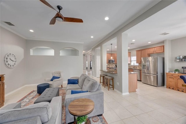 7522 Bell Isle, Corpus Christi, TX 78414 - living area with ceiling fan, light tile patterned floors, recessed lighting, and crown molding